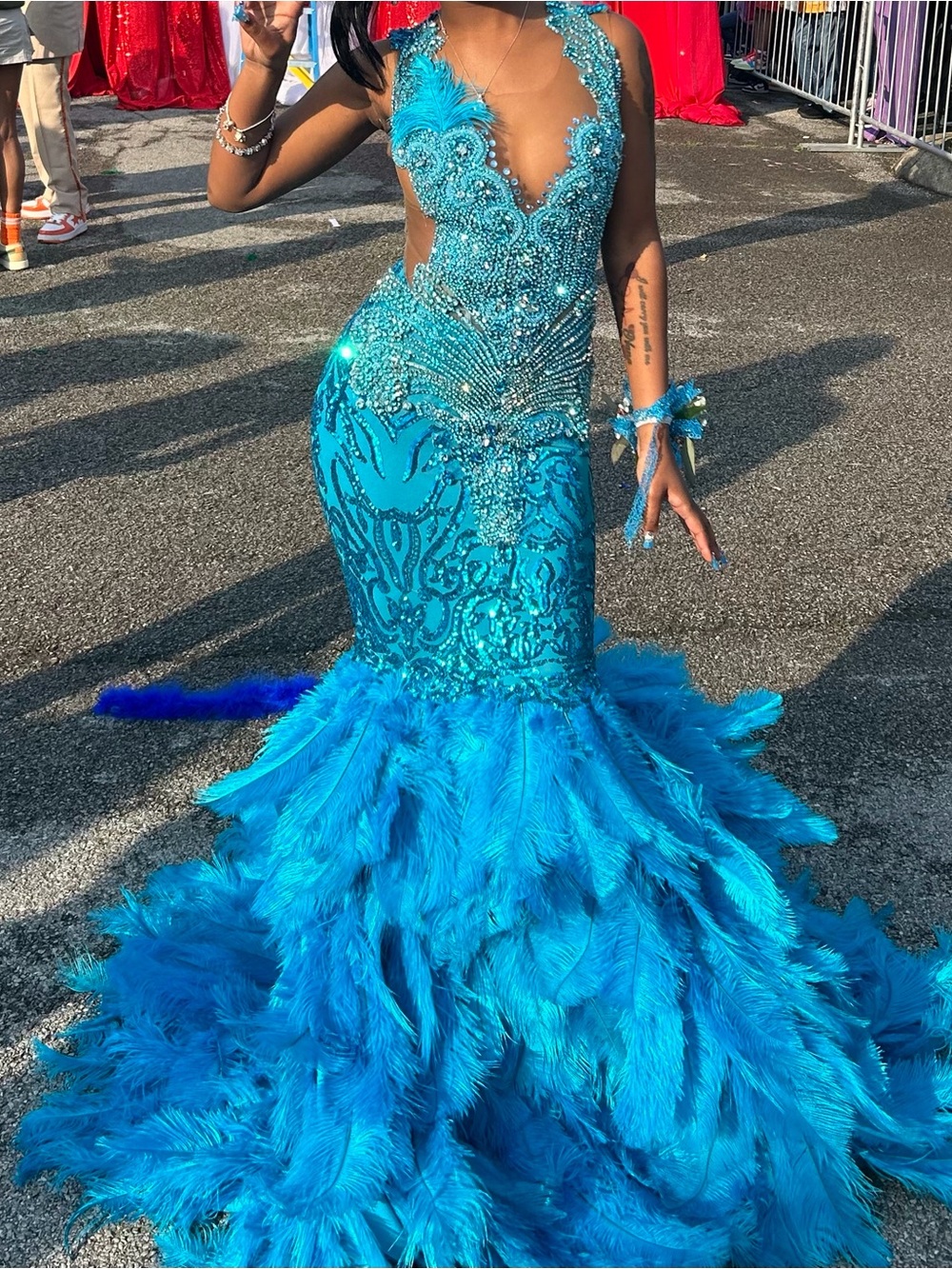 Turquoise Feather-Trimmed Mermaid Prom Dress with Beaded Bodice